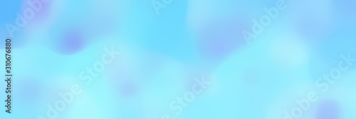 blurred horizontal background with light sky blue and pale turquoise colors and free text space