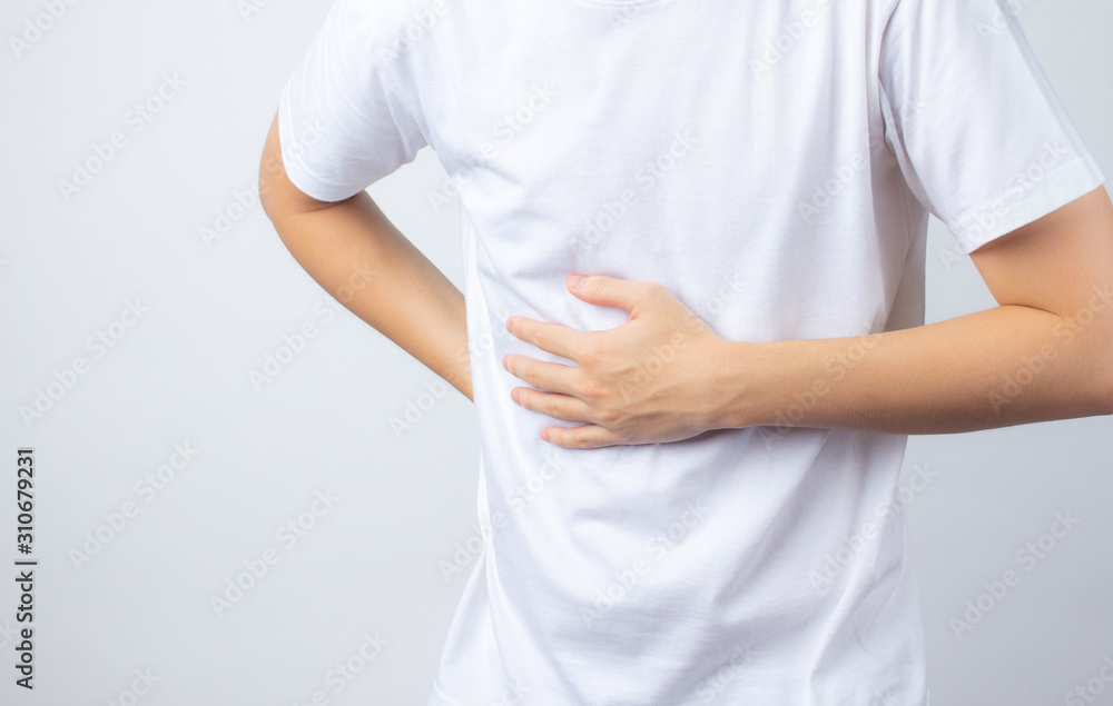 Men touch the bowel irritable Fluctuating intestine due to food poison with health concept on white background Men touch the bowel irritable Fluctuating intestine due to food poison with health concept on white background