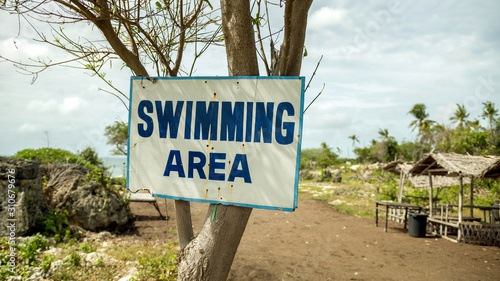 Swimming area sign on the beach, Philippines