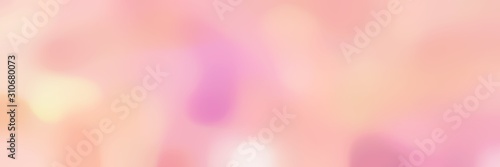 soft blurred horizontal background with baby pink, pastel magenta and blanched almond colors and space for text