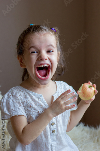 Funny little girl kid eats ...