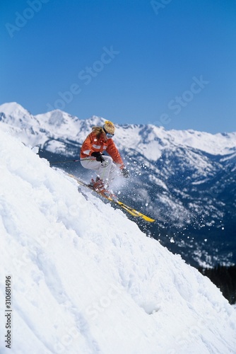 Skier Skiing Down Ski Slope