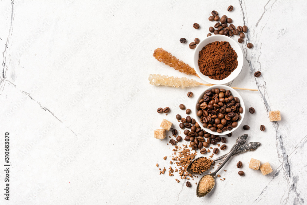 Roasted beans and ground coffee with sugar for morning espresso Roasted beans and ground coffee with sugar for morning espresso