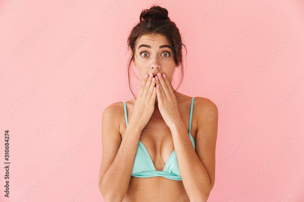 Beautiful young slim girl wearing bikini standing isolated Beautiful young slim girl wearing bikini standing isolated