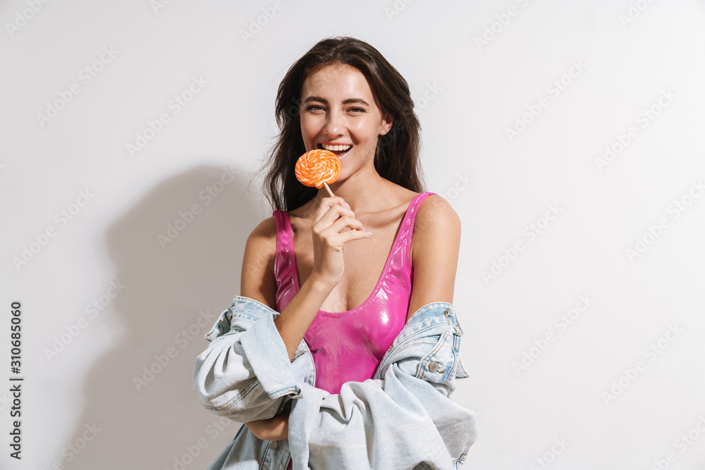 Attractive young brunette woman wearing swimsuit Attractive young brunette woman wearing swimsuit