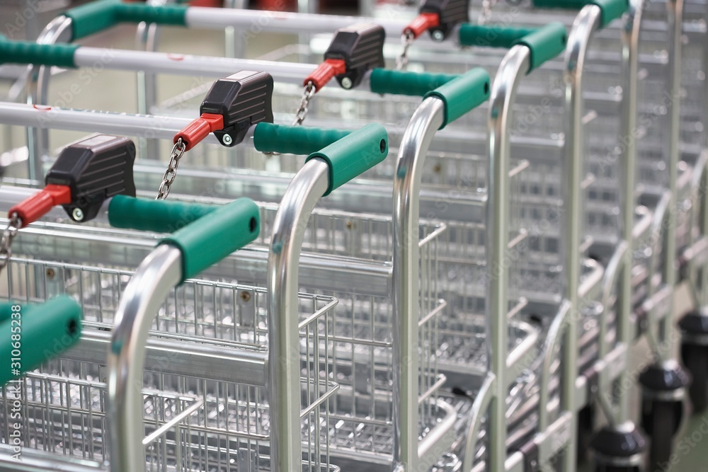 Empty Shopping Carts Linked Together Empty Shopping Carts Linked Together