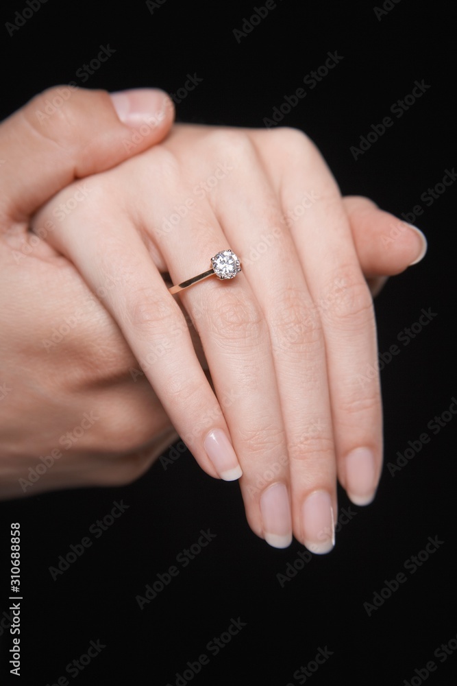 Hands Together With Woman's Engagement Ring Hands Together With Woman's Engagement Ring