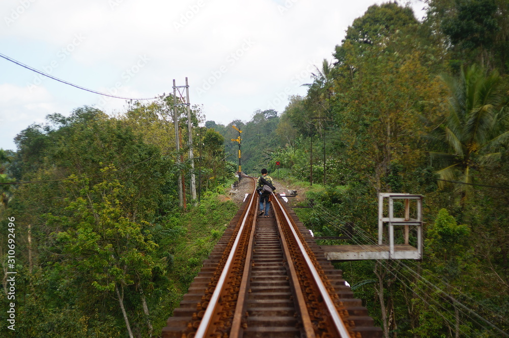 Fototapeta premium Railroad is a means of transportation for trains that are built on bridges using iron and a solid concrete frame