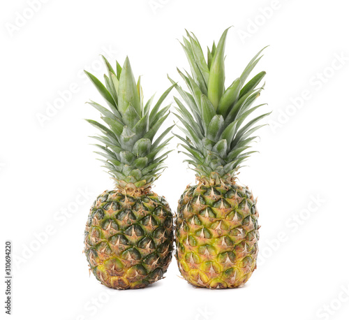 Pineapples isolated on white background. Juicy fruit © Atlas