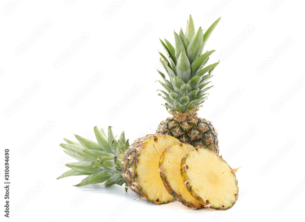 Pineapple and slices isolated on white background Pineapple and slices isolated on white background