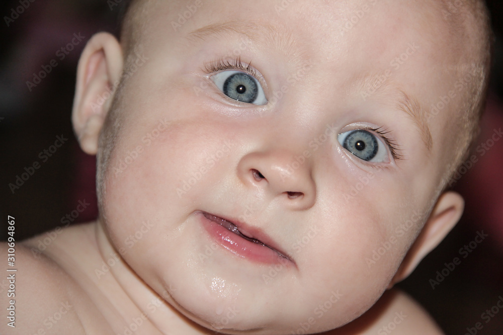 portrait of a baby with blue eyes portrait of a baby with blue eyes