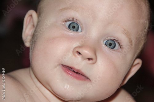 portrait of a baby with blue eyes