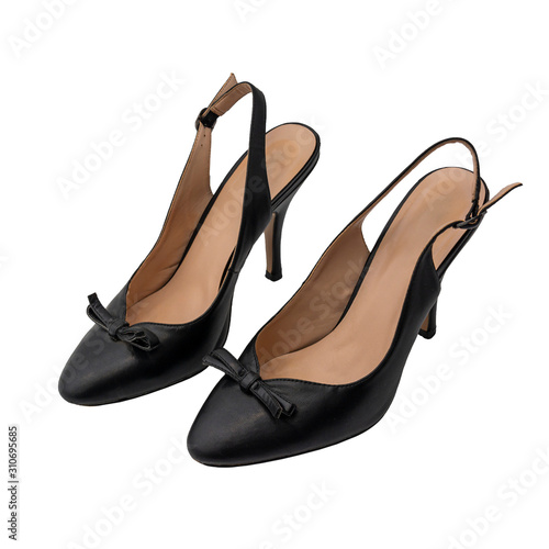 Black, female, classic shoes isolated on a white background.