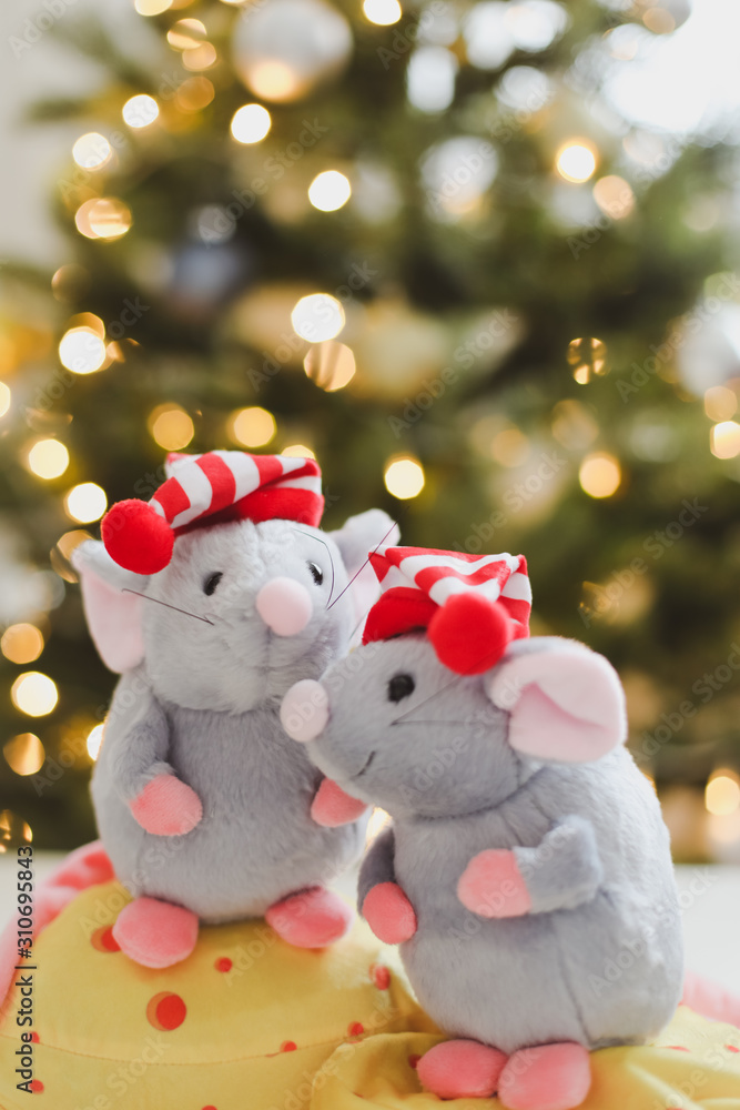 Fototapeta premium Little mouse toy, symbol of 2020. new year decoration. New Year 2020 Symbol. Greeting Christmas card. Selective focus.