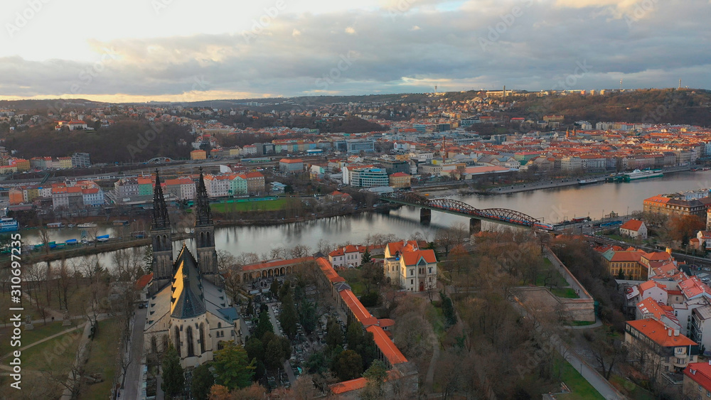 Aerial view of Vesehrad over river Vltava at sunset light in winter time in Prague, Czech republic