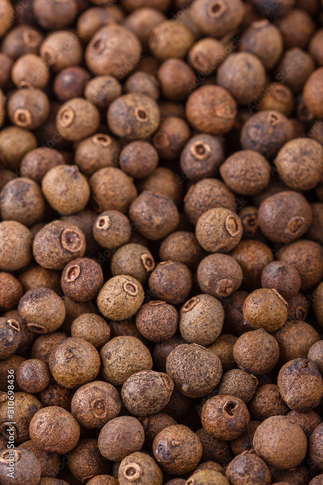 fresh spicy peppers allspice on white acrylic background fresh spicy peppers allspice on white acrylic background
