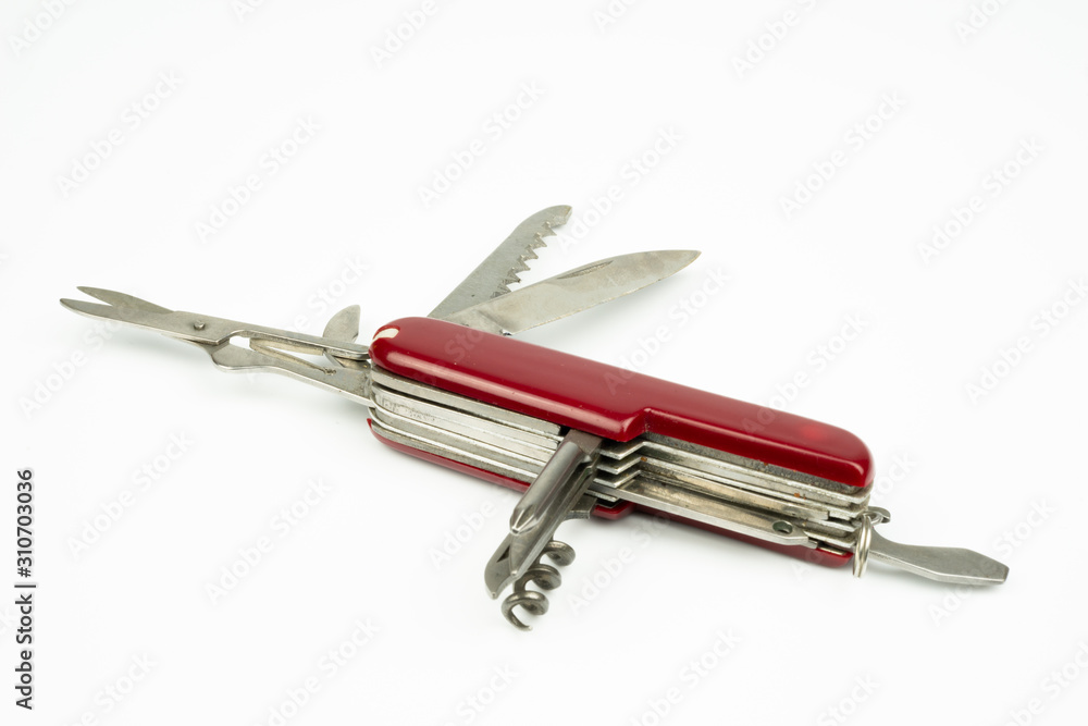 Close up of Swiss style multipurpose knife, isolated on white background Close up of Swiss style multipurpose knife, isolated on white background