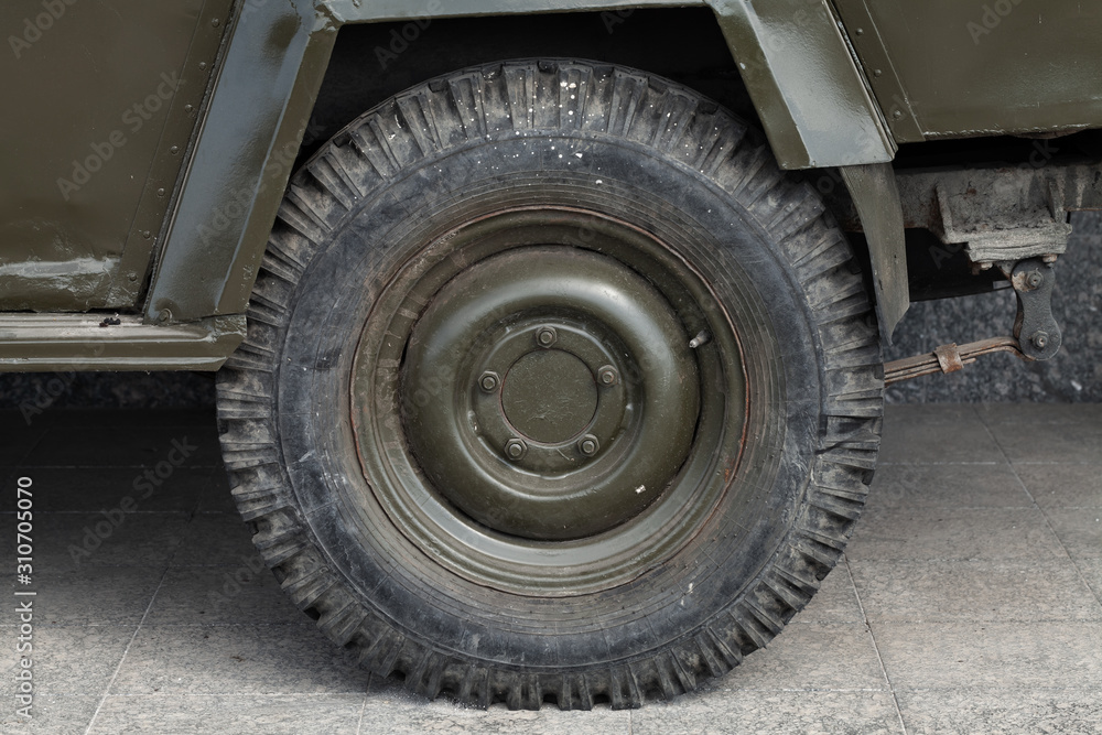 Close-up photo of military car wheel Close-up photo of military car wheel