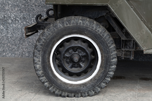 Closeup photo of old military car wheel