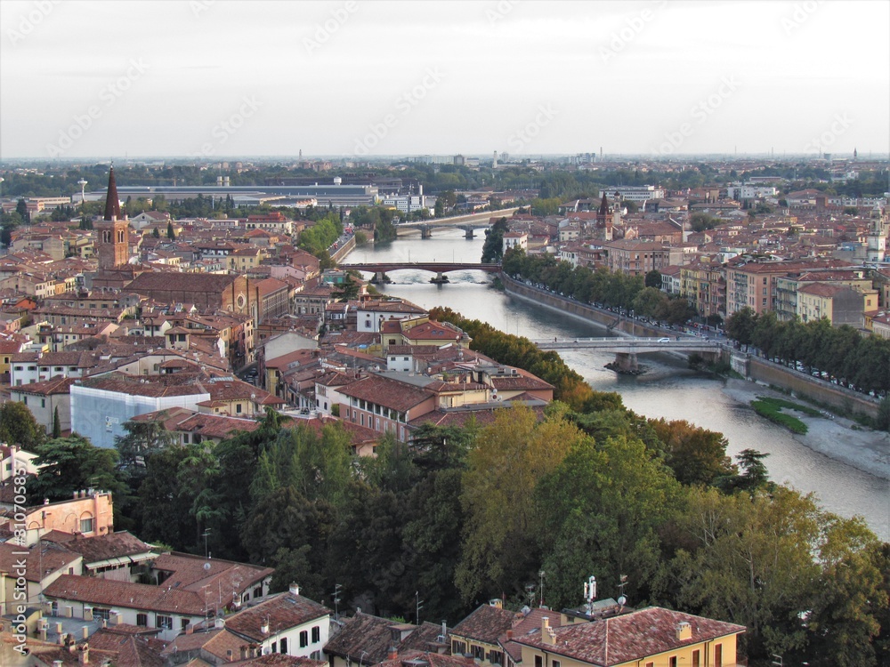 View of Verona Streets and Architecture. The Beautiful city of Romeo and Julietta shows its beauty full of details and history. Towers (Torre di Lamberti), Bridges (Ponte di Castelvecchio).