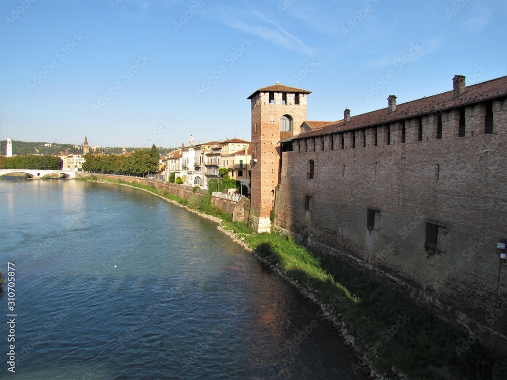 View of Verona Streets and Architecture. The Beautiful city of Romeo and Julietta shows its beauty full of details and history. Towers (Torre di Lamberti), Bridges (Ponte di Castelvecchio).