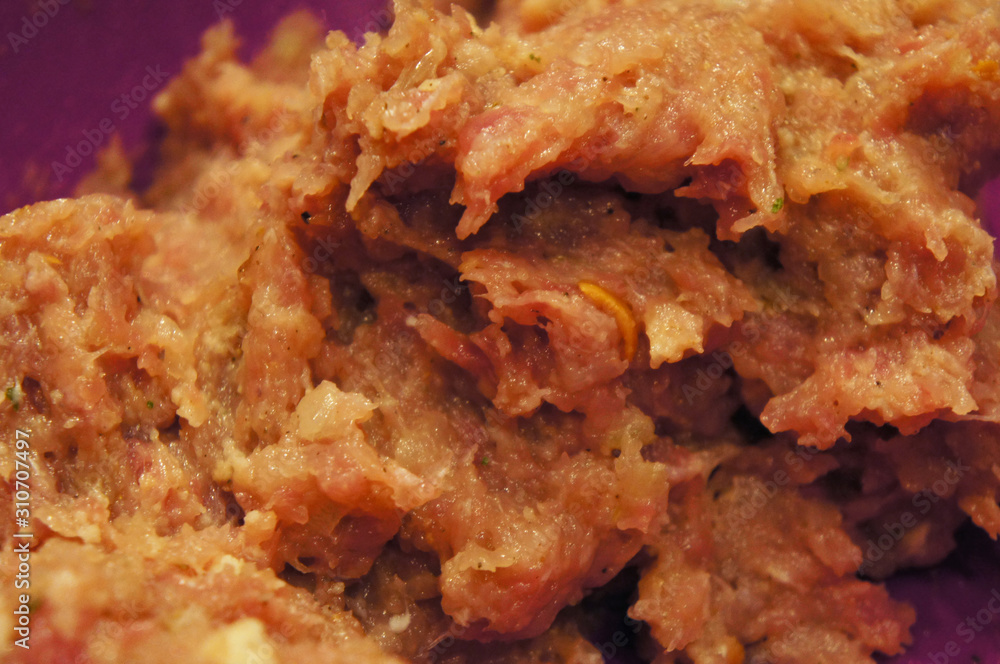 Pork minced meat for cooking cutlets and meatballs in a bowl. Pork minced meat for cooking cutlets and meatballs in a bowl.