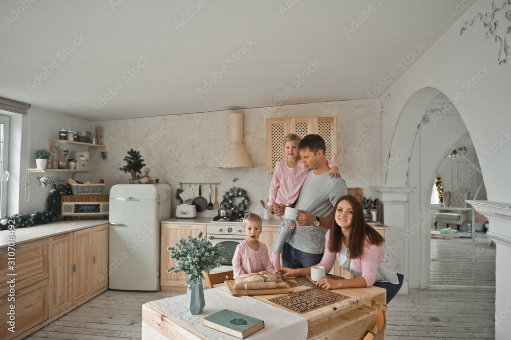 The kitchen chores of a young family to meet Christmas 2097. The kitchen chores of a young family to meet Christmas 2097.
