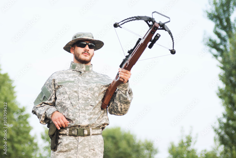 Holding Crossbow