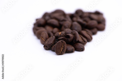 Fototapeta Naklejka Na Ścianę i Meble -  Close up of coffee beans on a white background