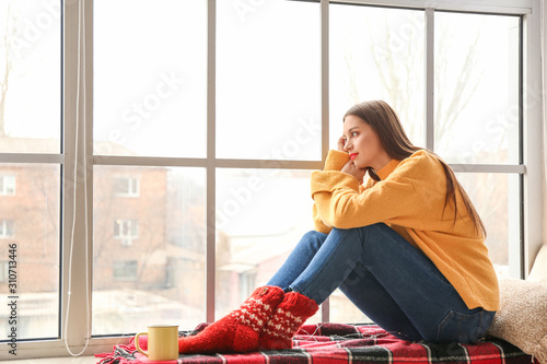 Young woman in winter cloth...