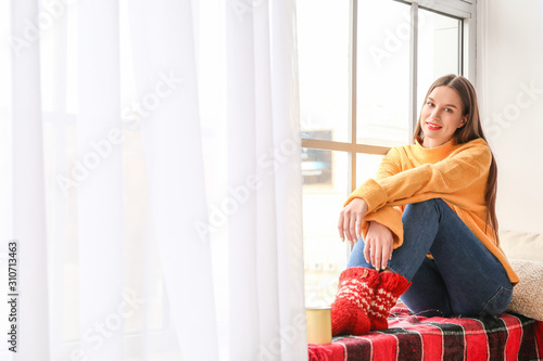 Young woman in winter cloth...