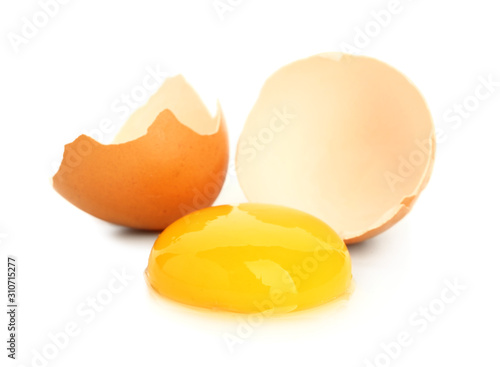 Broken fresh egg on white background