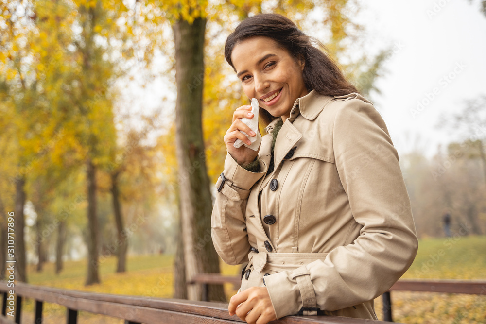 Fototapeta premium Positive delighted female person posing on camera