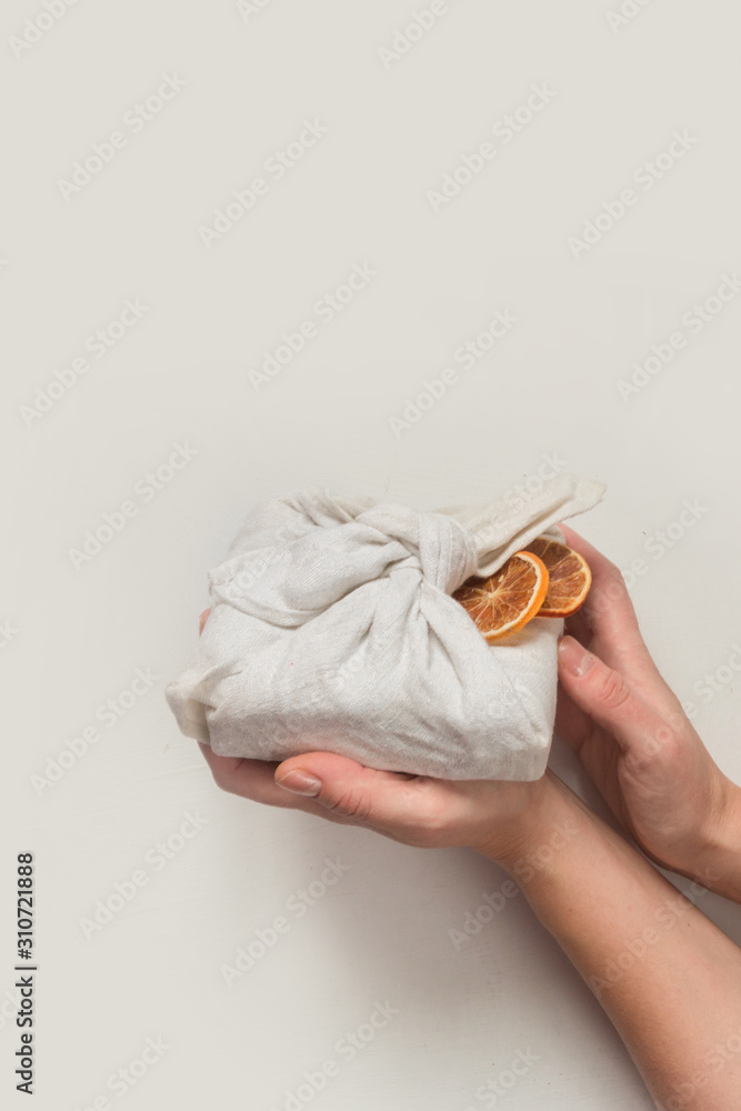 Obraz premium Zero waste, Christmas eco-friendly gift wrapping in traditional Japanese Furoshiki style, environmental gift wrapping concept, eco friendly banner.