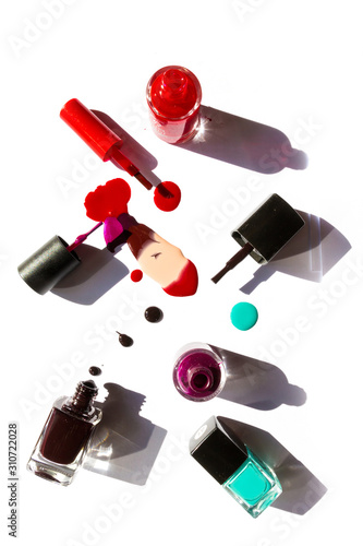 Colorful nail lacquer ads, nail polish splatter on white background