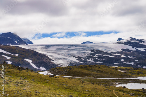 Fototapeta Naklejka Na Ścianę i Meble -  Mountains with ice glacier. Road Sognefjellet, Norway