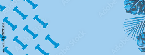 Blue dumbbell pattern on classic blue background with copy space.