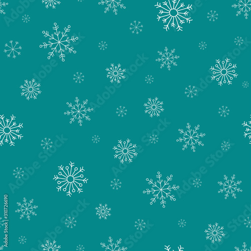 Hand drawn white snowflakes on turquoise background. winter Christmas seamless pattern. New Year backdrop.
