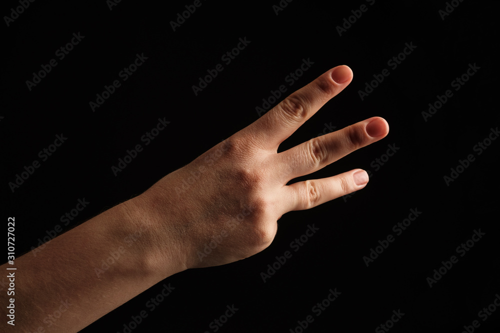 Numbers 3 in sign language. gesture number 3. hand gesture pay attention. women hand sign isolated on black background. finger pointer Numbers 3 in sign language. gesture number 3. hand gesture pay attention. women hand sign isolated on black background. finger pointer
