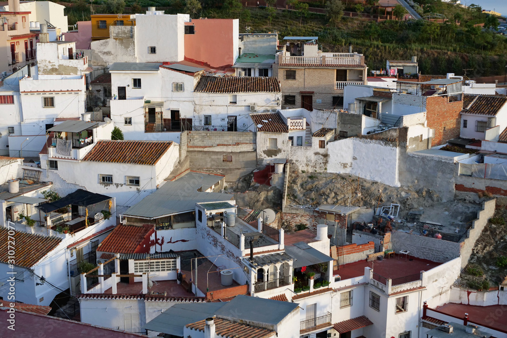 View on the houses and roofs of the old part of Velez-Malaga from above, Spain, Europe