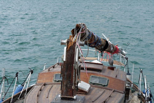 Top of a shipwrecked sailing boat with broken mast