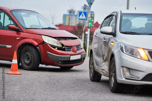 car crash accident on street. damaged automobiles © Kadmy