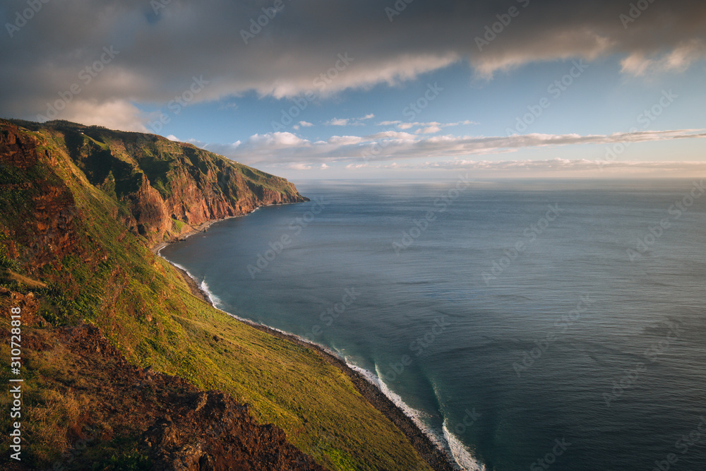 Beautiful coastline of Madeira islands. Colorful sunset scene by the ocean.