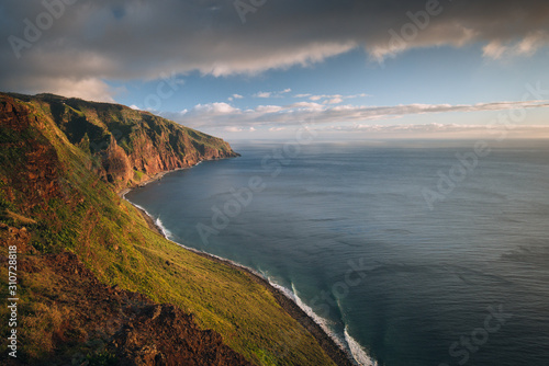 Beautiful coastline of Madeira islands. Colorful sunset scene by the ocean.
