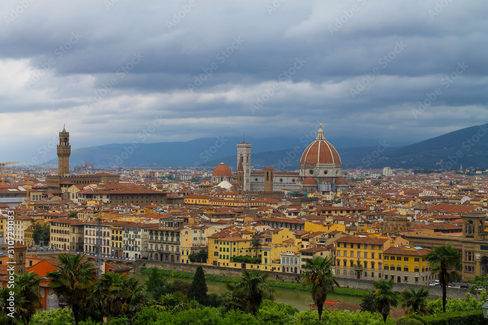 Aerial view of Florence Italy, beautiful old city full of historical amazing buildings, cathedrals and bridges. 