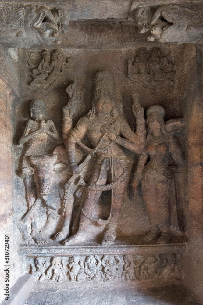 Cave 1 : Shiva , Parvati and Nandi bull sculpture. Badami Caves, Bijapur district, Karnataka, India.