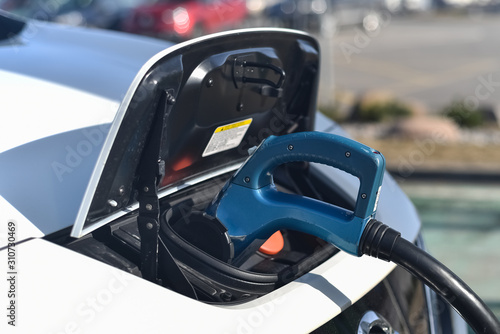 Charging electric vehicle