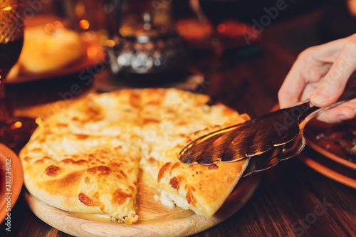 Georgian khachapuri imeruli - Georgian traditional cuisine. close-up photo