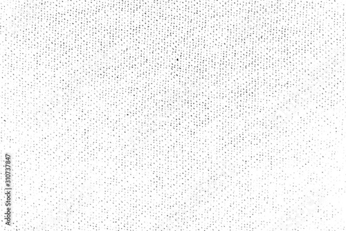 Subtle halftone grunge urban texture vector. Distressed overlay texture. Grunge background. Abstract mild textured effect. Vector Illustration. Black isolated on white. EPS10.