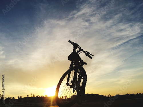 bycicle silhouette at sunset